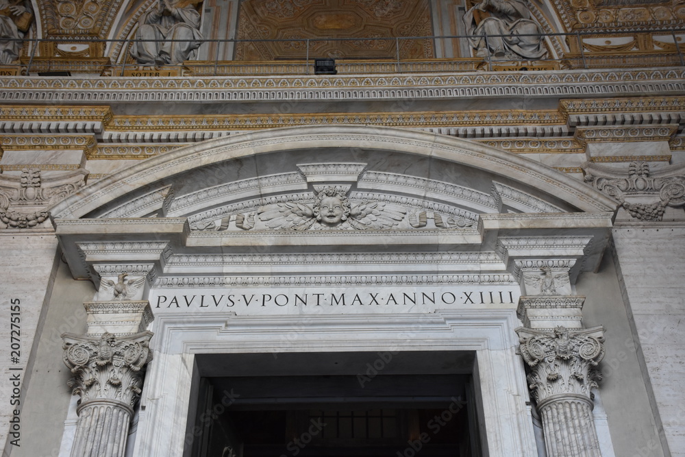 Rome. Atrium Exterior  of the Basilica of San Pietro. Details of an entrance to the basilica