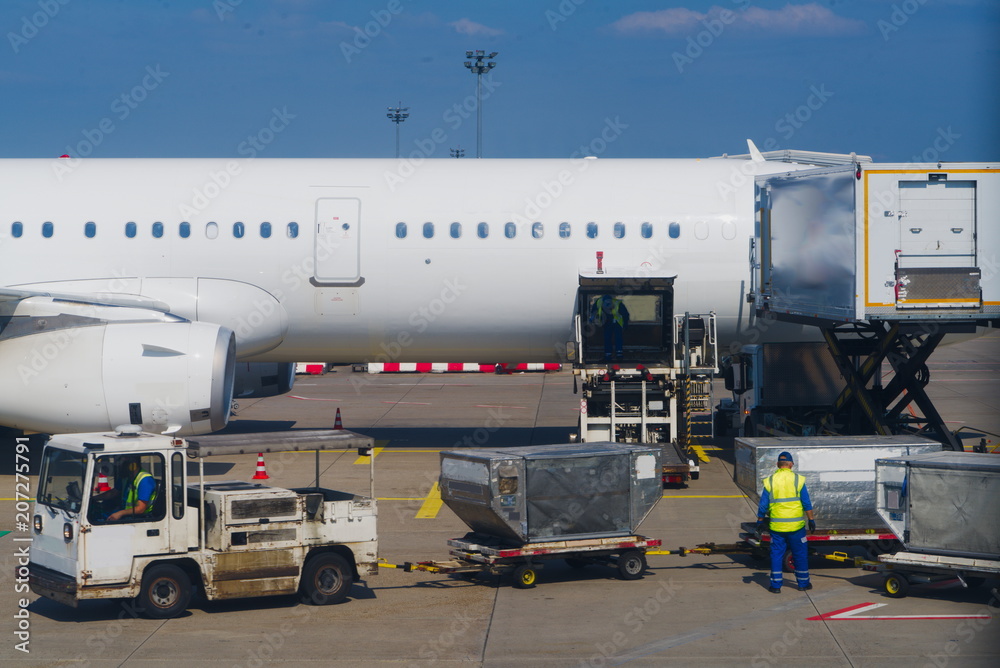 Naklejka premium airplane waiting for cargo loading