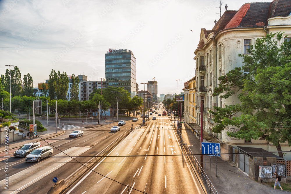 Fototapeta premium Bratislava, Slovakia - May 24, 2018: Street traffic in Bratislava town in downtown. 