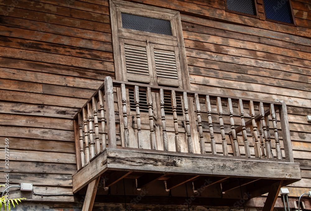 The door and a wooden terrace.