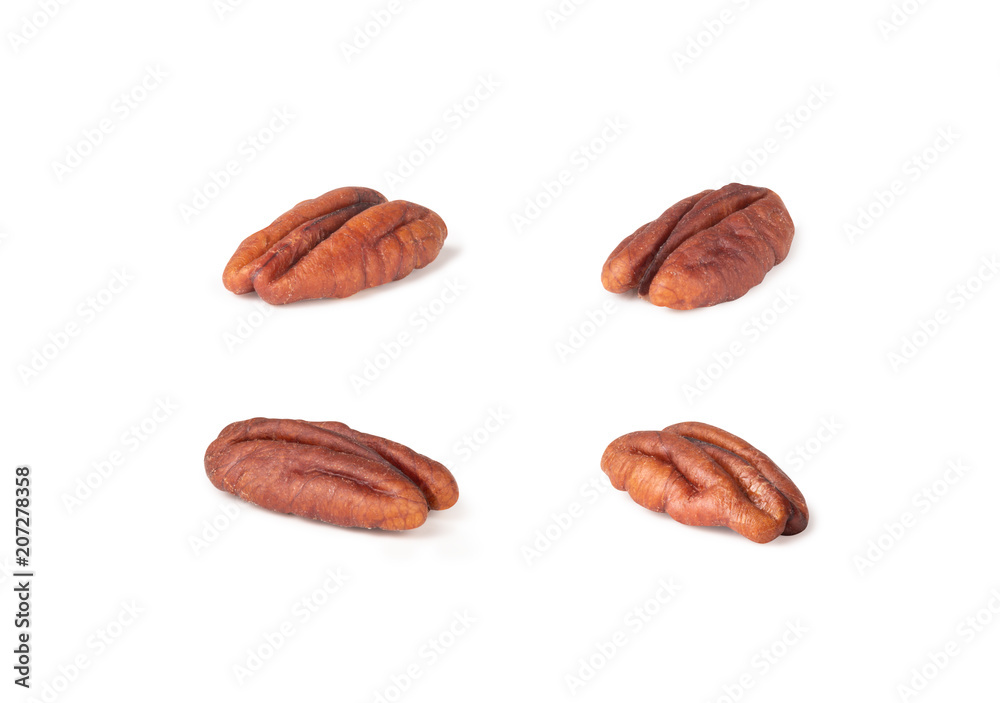 Pecan nuts topped with light salt isolated in pieces on white background, macro shot (clipping path included of each piece) Pecan nuts topped with light salt isolated in pieces on white background, macro shot (clipping path included of each piece)
