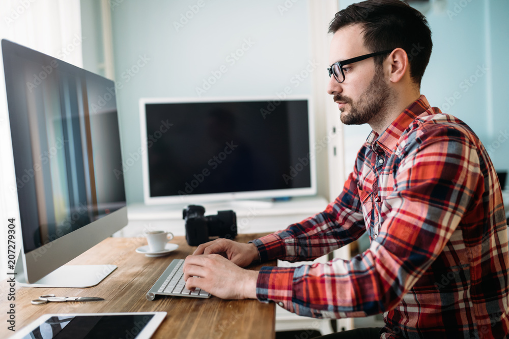Young designer working on project at home Young designer working on project at home