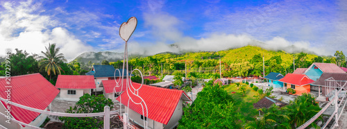 Beautiful nature landscape photography,Colorful home and tourist accommodation on the mountain with fog and cloud in morning time background,Thailand. photo