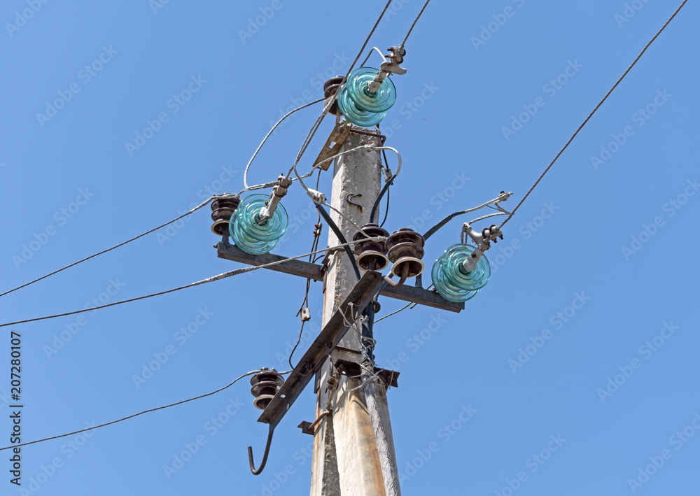 Electrical tower on background of blue sky
