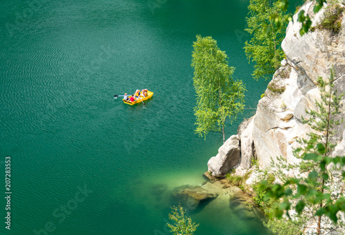 emerald piskovna lake in Adrspach rock town, Teplice rocks, Czech republic photo