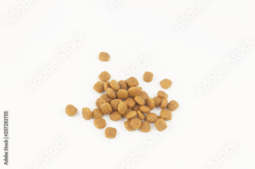 Dry one color kibble dog or cat food on isolated white background.