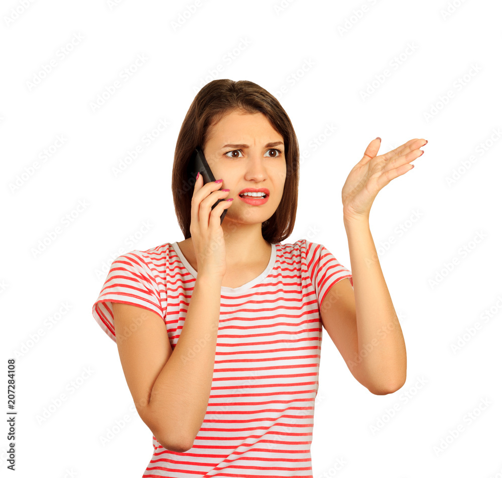 Misunderstanding and distant call young woman talking on mobile phone has many questions. emotional girl isolated on white background Misunderstanding and distant call young woman talking on mobile phone has many questions. emotional girl isolated on white background