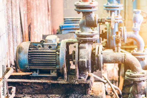 Industrial water pump in an old Soviet concrete plant