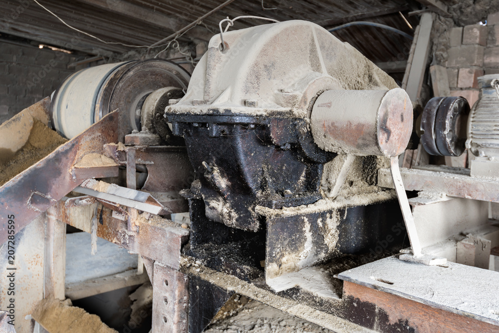 The aggregate distribution of materials for the production of concrete in the old Soviet factory. The aggregate distribution of materials for the production of concrete in the old Soviet factory.