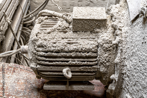 Concrete mixer in the old Soviet concrete plant. photo