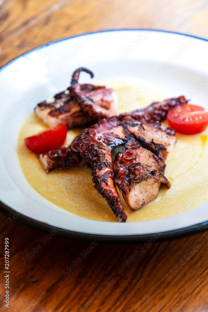 Mediterranean Octopus with vegetables and potatoes Mediterranean Octopus with vegetables and potatoes