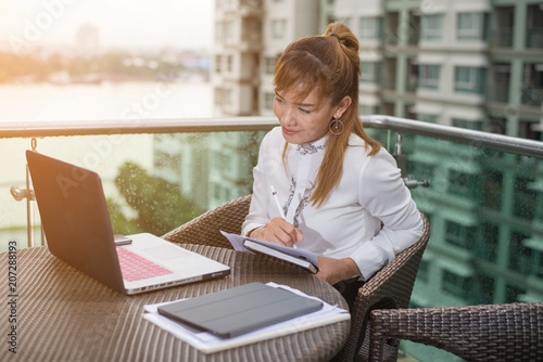 Senior asian businesswoman working in modern office