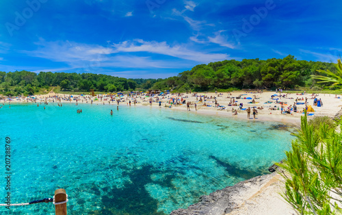 People enjoying summer holiday on S Amarador beach of Mallorca, island of Spain
