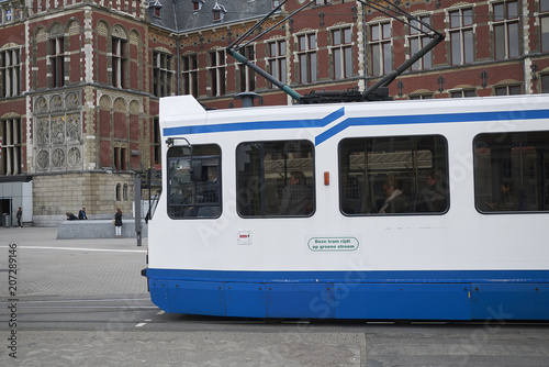 Amsterdam, Netherlands - May 16, 2018: Tram departing from Centraal Station square