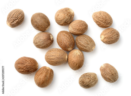 nutmeg spice isolated on white, top view photo