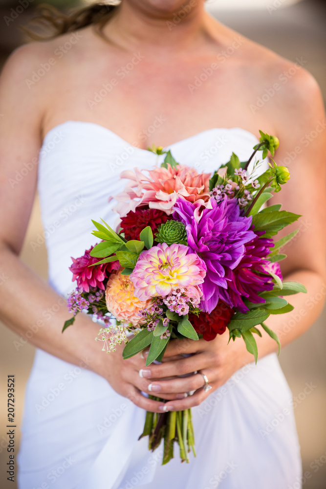 Bride Holding Bouquet of Colorful Flowers Bride Holding Bouquet of Colorful Flowers