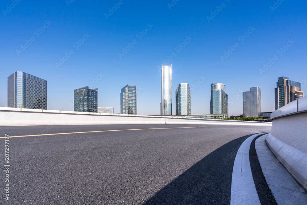 city skyline with empty asphalt road in urban city skyline with empty asphalt road in urban
