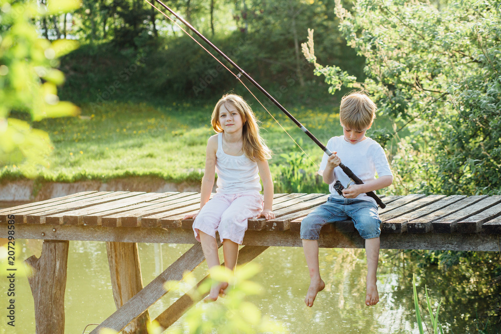 Child Girl Sits On Wooden Fishing Stock Photo 1226251222