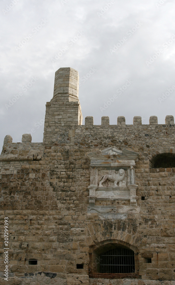The relief with the lion on the wall of the medieval Venetian fortress Koules in Heraklion, Crete, Greece.