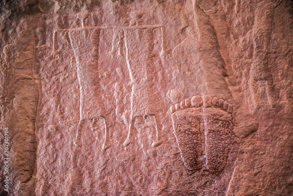 Nabatean and Thamudic inscriptions on rock in Wadi Rum desert Nabatean and Thamudic inscriptions on rock in Wadi Rum desert