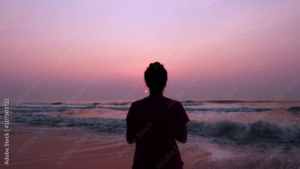 Woman help plant propagation on the beach. Woman help plant propagation on the beach.