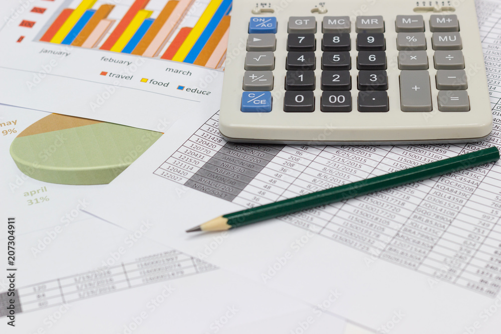 business paper graphs and pencil with charts report , calculator on desk of financial planing, concepts business and cost. business paper graphs and pencil with charts report , calculator on desk of financial planing, concepts business and cost.