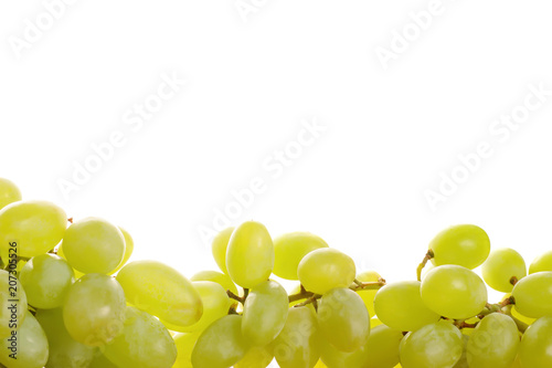 Green grapes isolated on white