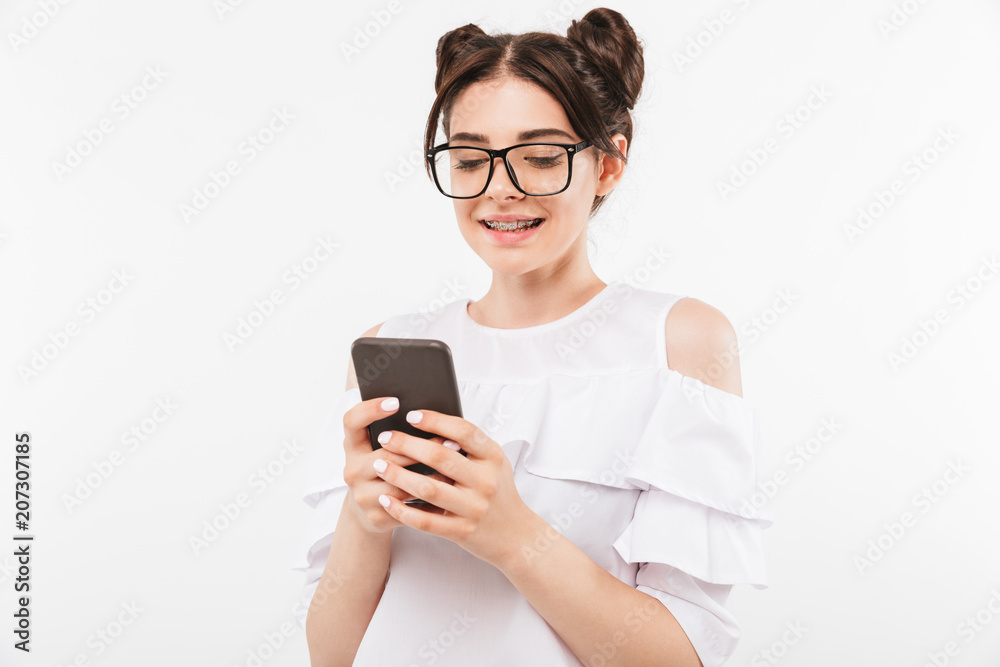 Portrait of a smiling young girl in sunglasses Portrait of a smiling young girl in sunglasses