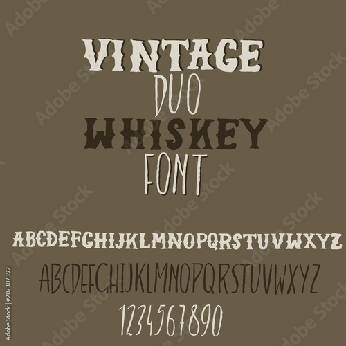Grunge vintage whiskey font. Old handcrafted display skript. Modern brush label lettering. Vector typography illustration.