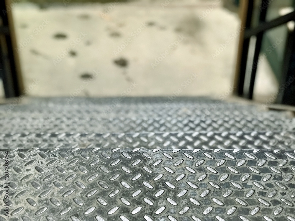 Fototapeta premium Steps of iron stairs, top view 