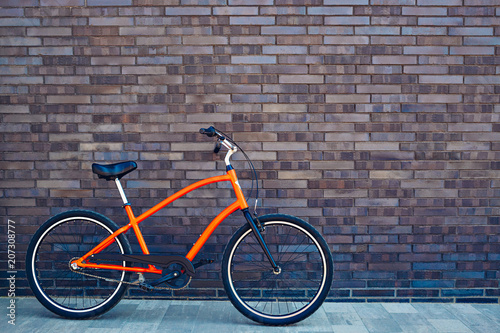 City bike on a brick wall background