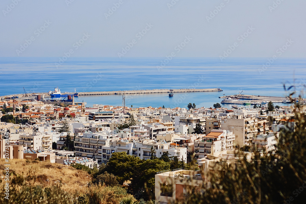 Obraz premium Top view of the Greek city Rethymno, harbor and Aegean Sea, Crete, Greece