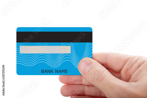 Hand holding credit card isolated on white background