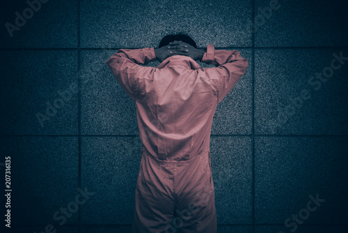 Fotografi Portrait of asian handsome man in Prison uniforms,He has a lot Mustache and mess