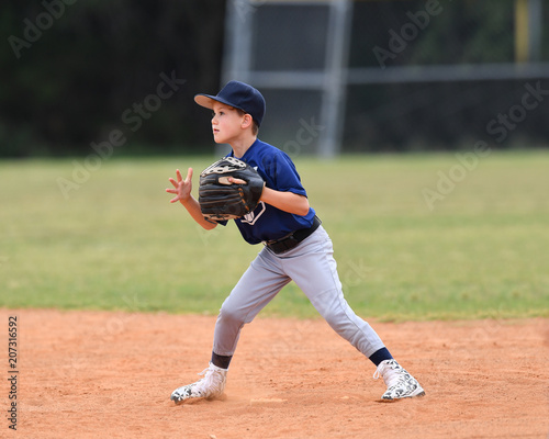 Photography Young boy playing youth baseball