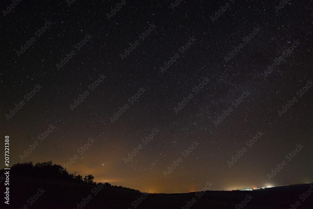 Galaxy The Milky Way in the night sky with stars. Space above the earth's surface. Long exposure.