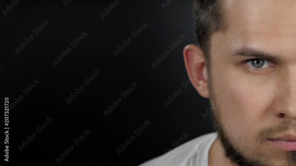 Football player sportsman head shot portrait with angry face, soccer man handsome isolated close up