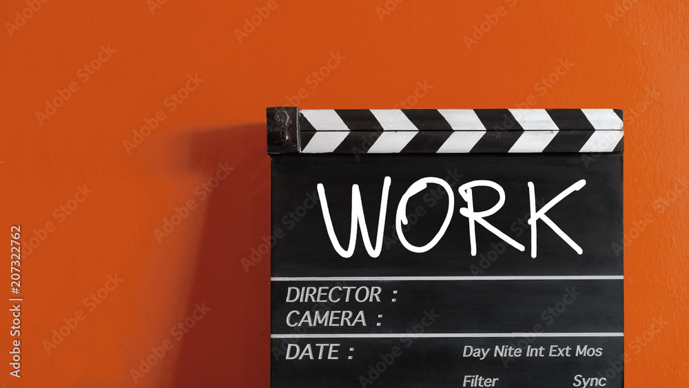 work  text title on wooden clapper board