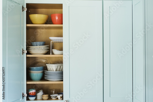 Dishes in cupboard photo