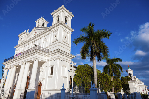 El Salvador, Cuscatlan, Suchitoto, Santa Lucia Church and palm trees photo