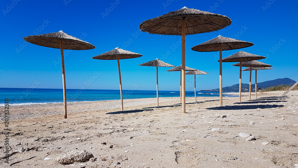 sea beach umbrellas in preveza kanali greece