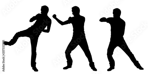 Silhouettes of fighting men isolated on white