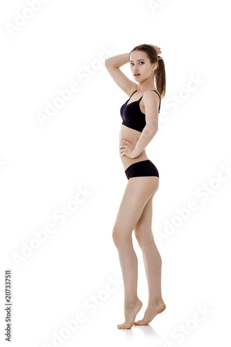 woman with perfect sporty body in black lingerie