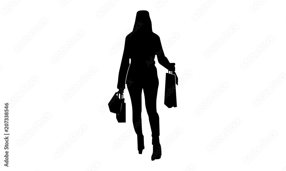 silhouette of a woman walking with a shopping bag