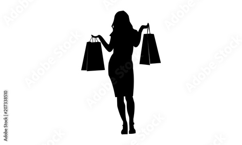 silhouette of a happy woman with a lift bag with two hands.