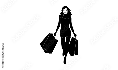 silhouette stylish walking beautiful woman carrying shopping bag