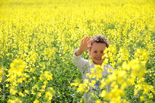 young boy in field
