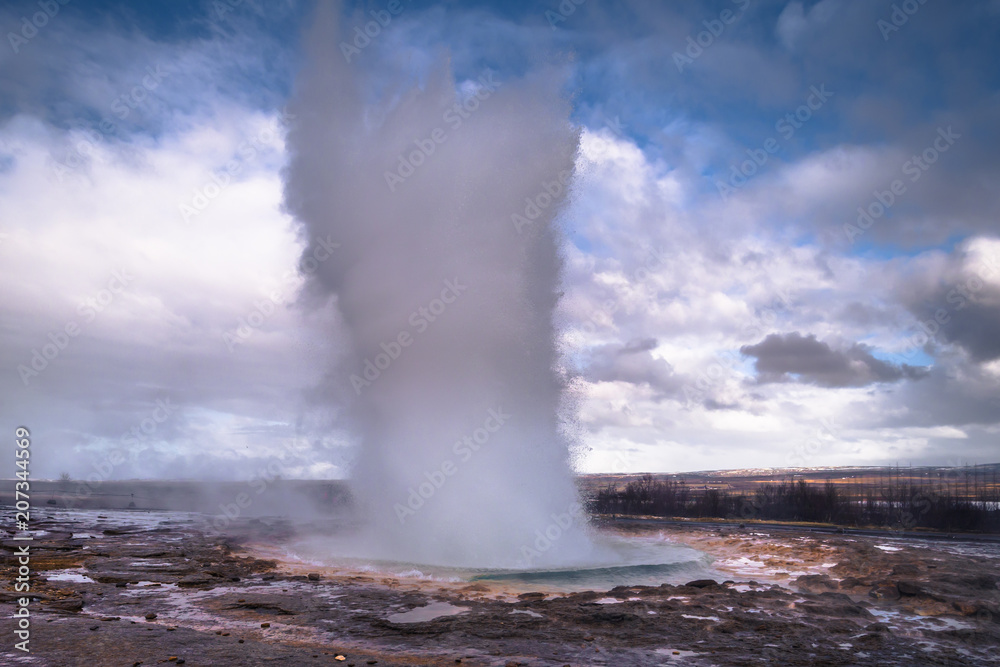 Geysir - May 03, 2018: A tall geyser eruption at Geysir, Iceland