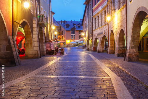 Nice street Rue Sainte-Claire in Old Town of Annecy at rainy night  France