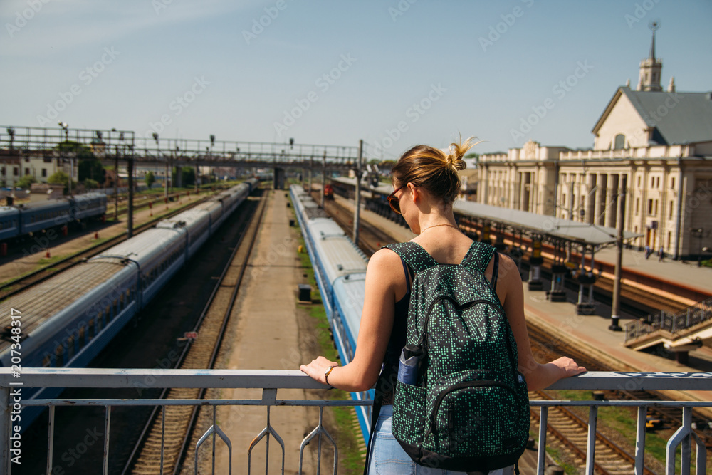 girl looks on railways girl looks on railways